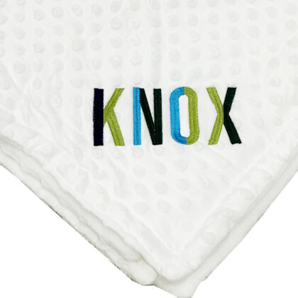 Minky blanket with colorful embroidered name